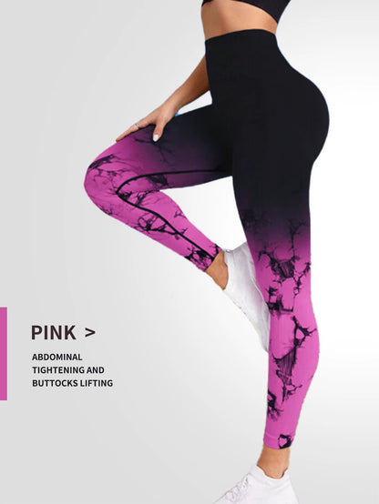 “Woman wearing high-waisted blue tie-dye seamless leggings, posing sideways to show fit and shape. Designed for workouts and gym use.”