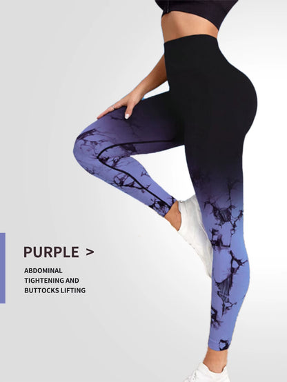 “Woman wearing high-waisted blue tie-dye seamless leggings, posing sideways to show fit and shape. Designed for workouts and gym use.”